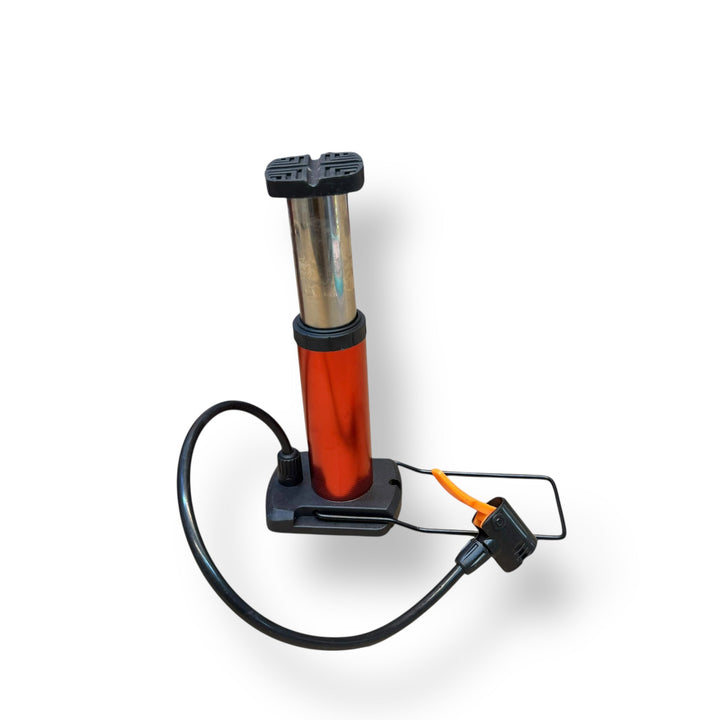 Red and silver portable imported mini foot pump with black hose and footrest for bicycles