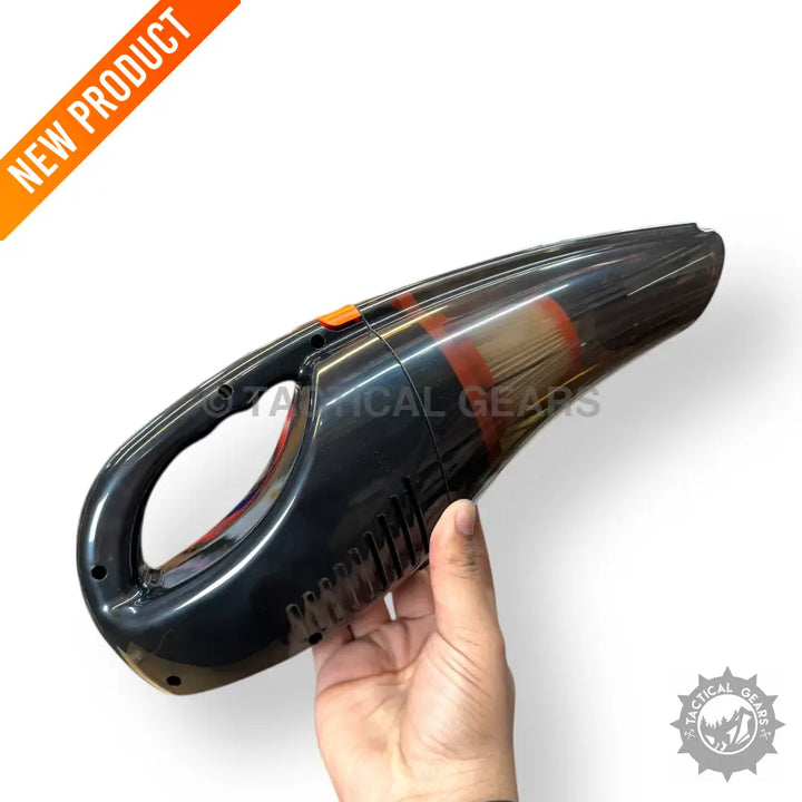 Black portable rechargeable car vacuum cleaner with orange power button and translucent dustbin