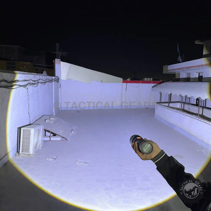 Powerful Tactical 3km LED Flashlights illuminating a wide area with bright light