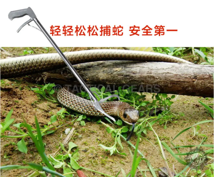 Professional snake catcher stick with long handle and gripping jaws for safe snake removal