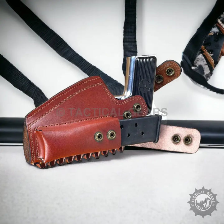 Brown leather holster with magazine pouch for carrying 9mm pistols