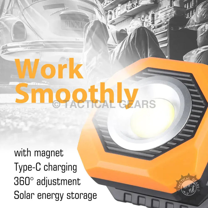 Orange hexagonal COB LED solar work light with pivoting adjustment and magnetic base
