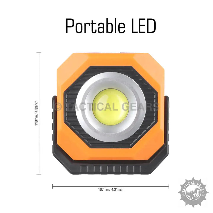 Orange and black portable COB LED work light with pivoting adjustment and dimensions