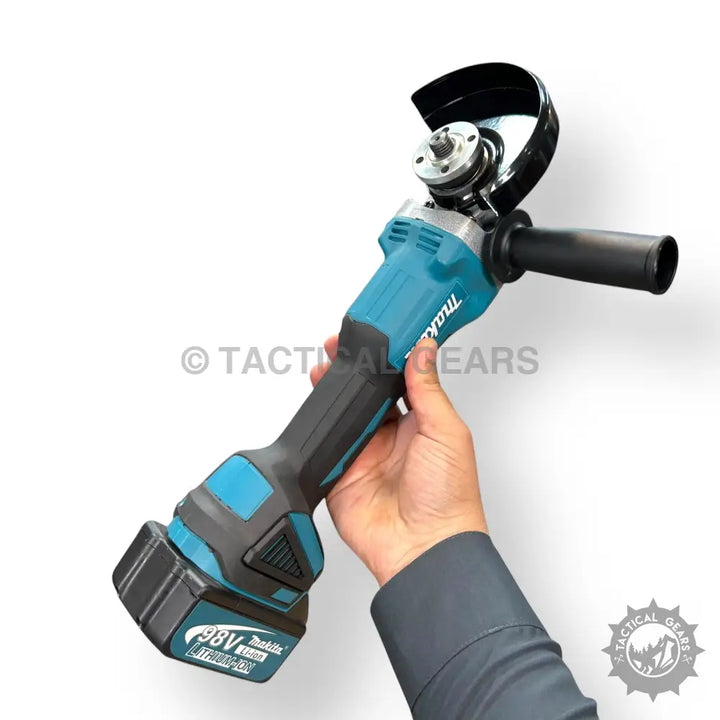Rechargeable angle grinder kit with teal and black body and removable battery pack