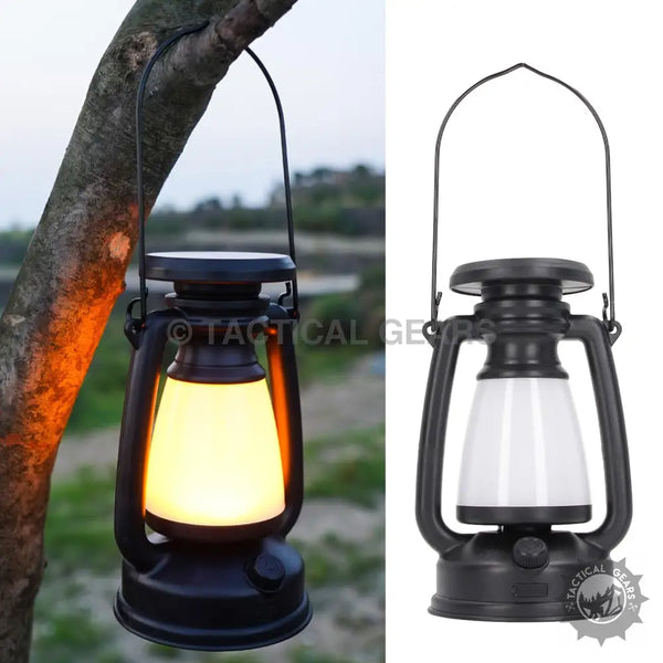 Black solar-powered rechargeable camping lamp with hanging handle and adjustable warm and cool light