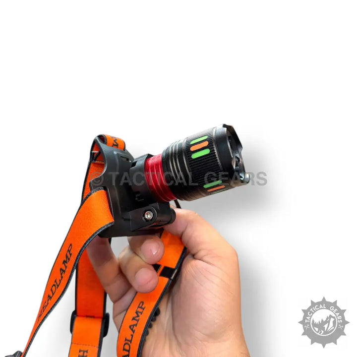 Rechargeable headlight with black and red LED, orange adjustable strap, lot imported