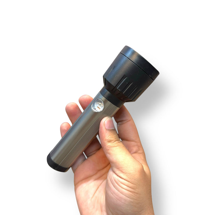 Hand holding Rechargeable LED Flashlight C191U with Side Light, a durable led flashlight