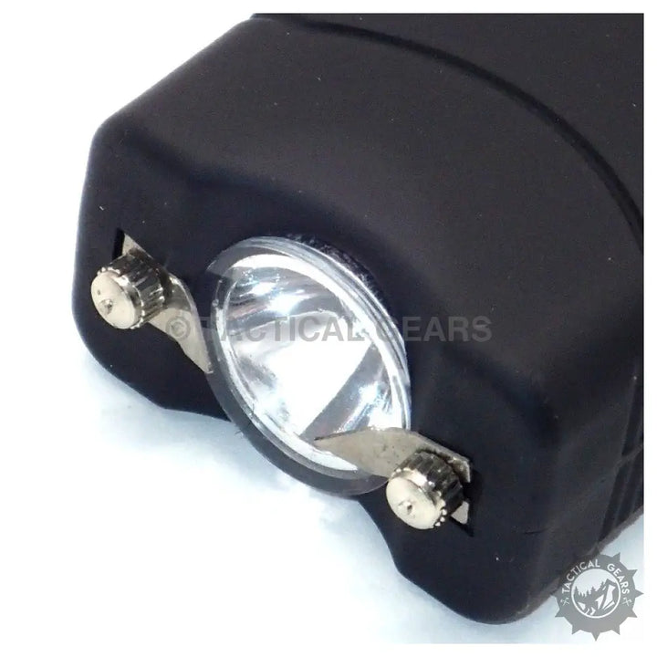 Black Tactical Pocket Taser with flashlight and exposed electrodes for self-defense