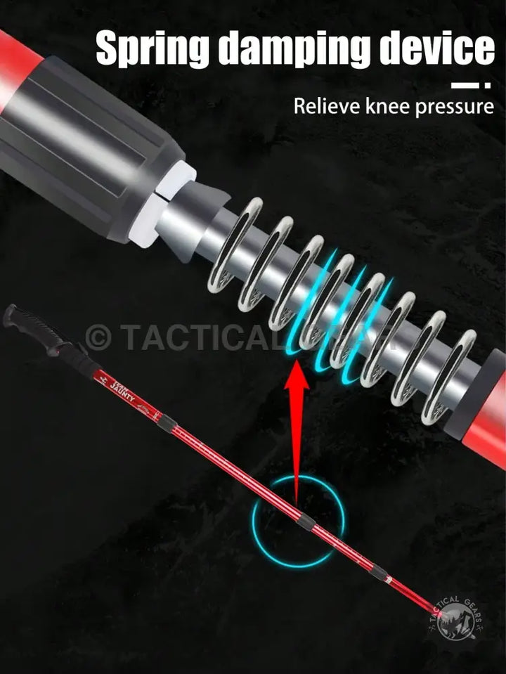 Red and black tactical spring damping device on AntiShock Hiking Stick