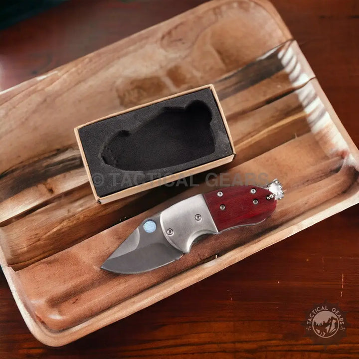 Browning Mini Knife: red and silver folding blade with wooden handle, blue accent
