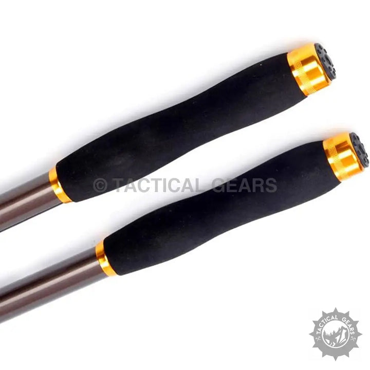 Black fishing rod handles with gold accents from Retractable Fishing Rod Set, part of a rod set
