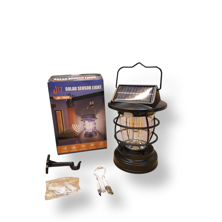 Black vintage-style solar sensor lamp with motion detection for outdoor lighting