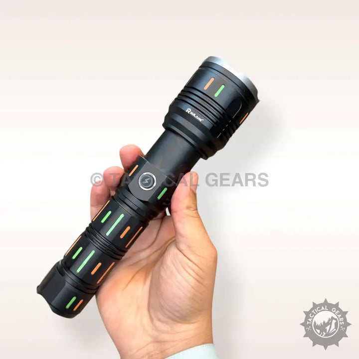 Black tactical flashlight with green and orange accents, textured grip, side power button, Ruilang 1KM powerful flashlight