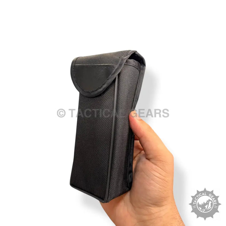 Black fabric pouch with rounded flap closure for Sakura 16x52 Monocular Telescope in hand