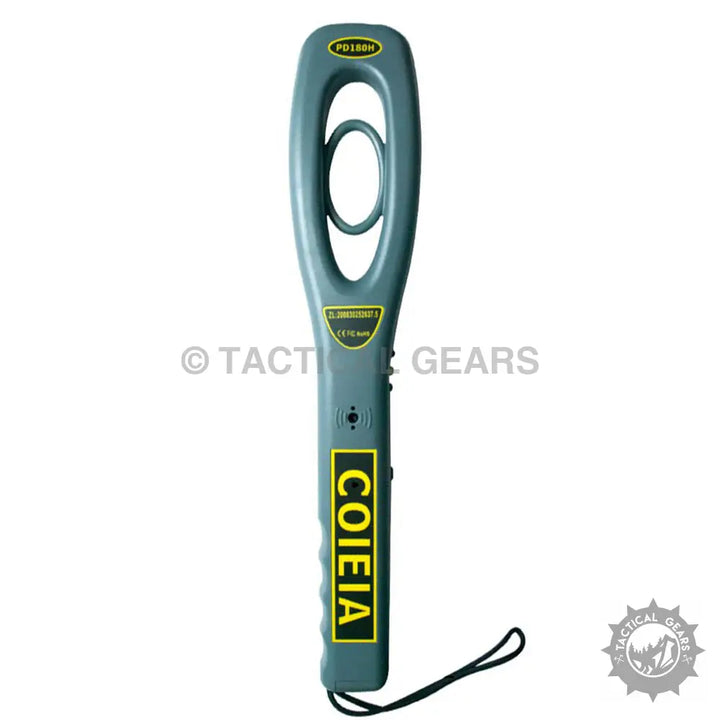 Grey handheld metal detector with yellow label for security inspection and detection