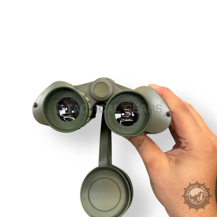 Olive green Seeker 10x50 Green Binoculars with attached objective lens covers for 10x magnification