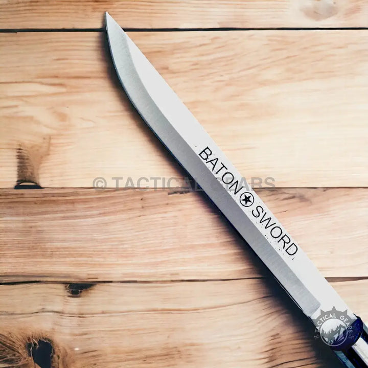 Self-defense US Baton Sword with metallic gray baton-style sword blade and pointed tip