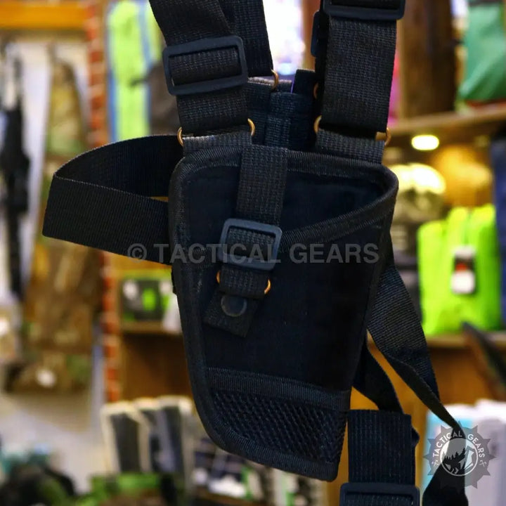 Black nylon tactical shoulder holster for concealed carry and firearm accessibility
