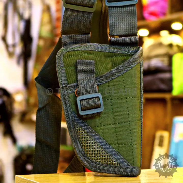 Olive green tactical shoulder holster with adjustable straps for comfortable carry