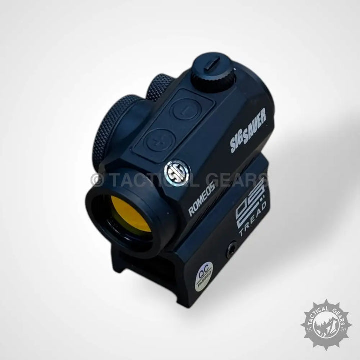 Black tactical red dot sight with yellow-tinted lens for Sig Sauer Romeo5 Electro Optics