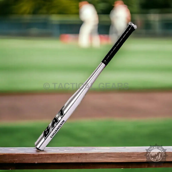 Silver aluminum baseball bat with black grip for powerful batting performance