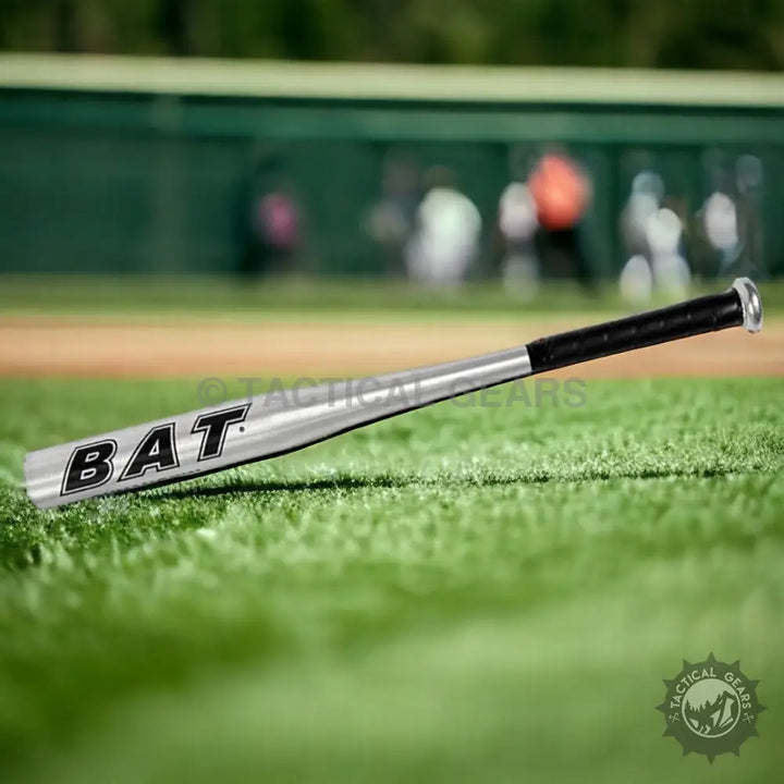 Silver aluminum baseball bat with black grip for durable performance and powerful hits