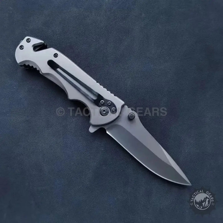 Gray SOG Tactical Folding Pocket Knife with serrated handle and sharp blade