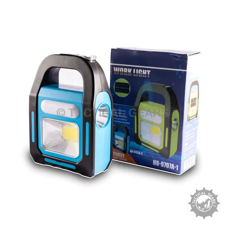 Portable blue and black emergency work light with handle and large LED panel for camping