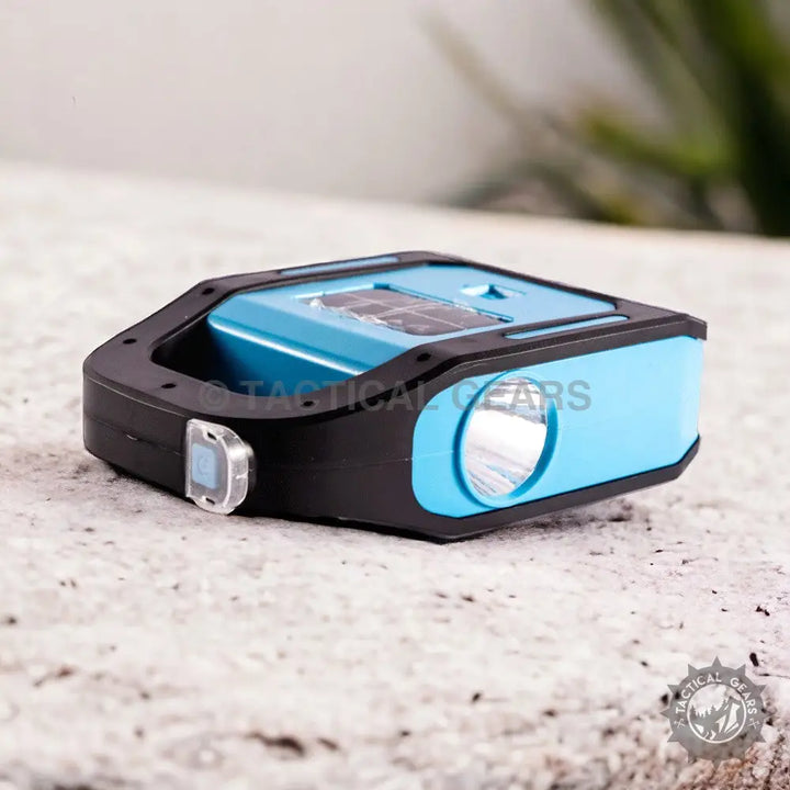 Blue and black multi-functional flashlight with solar panel, ideal emergency light for camping