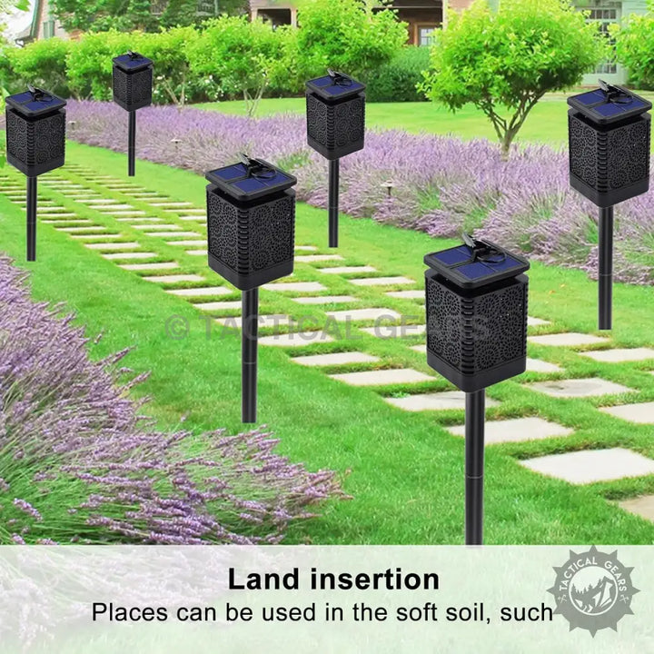 Black solar outdoor lanterns with decorative patterned design for outdoor garden lighting