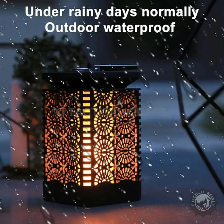 Solar outdoor garden lantern with decorative pattern and flickering flame effect