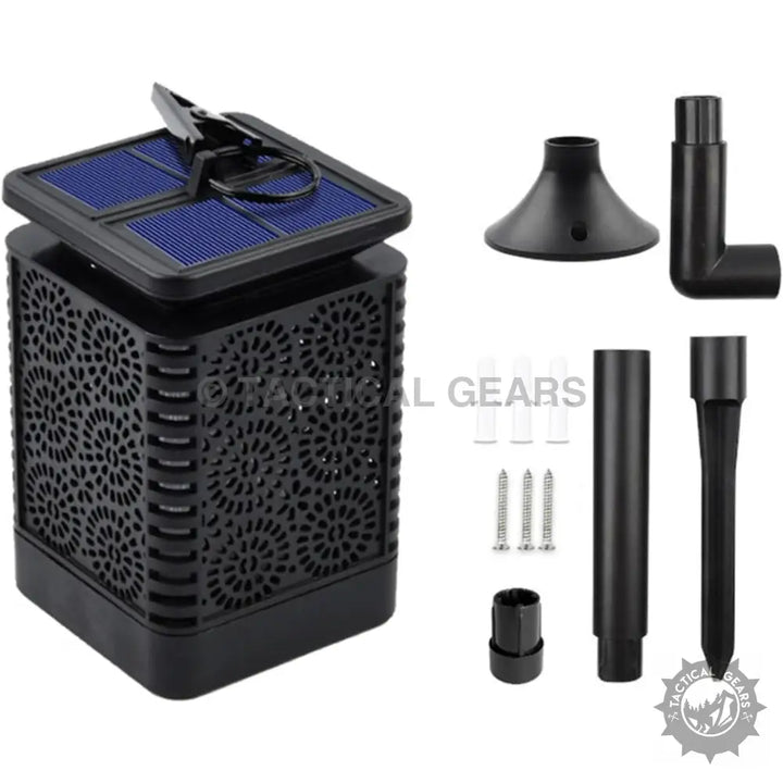 Black solar outdoor lantern with decorative cutouts and mounting accessories for outdoor garden lighting