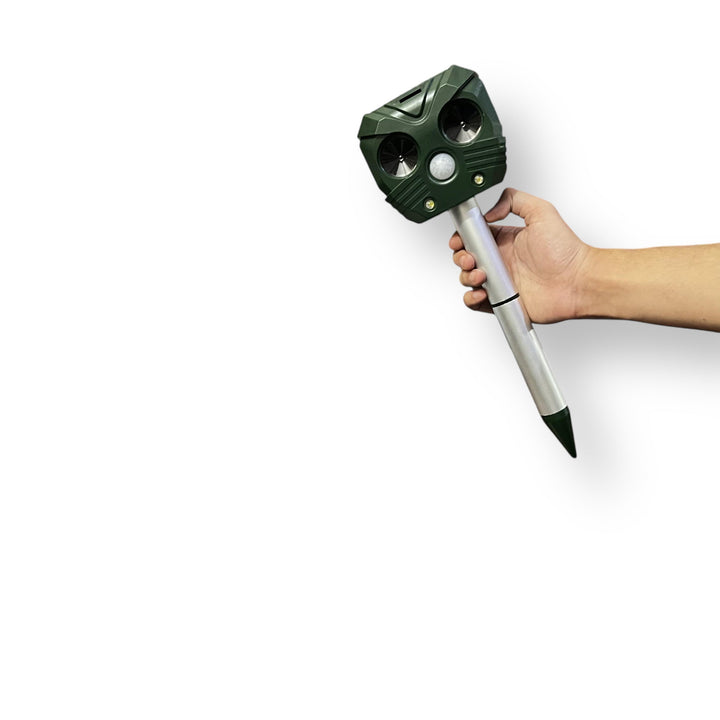 Green plastic solar-powered outdoor animal repellent device with ground stake