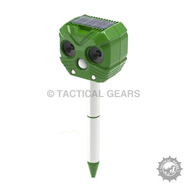 Green solar powered outdoor animal repellent on stake for pest control