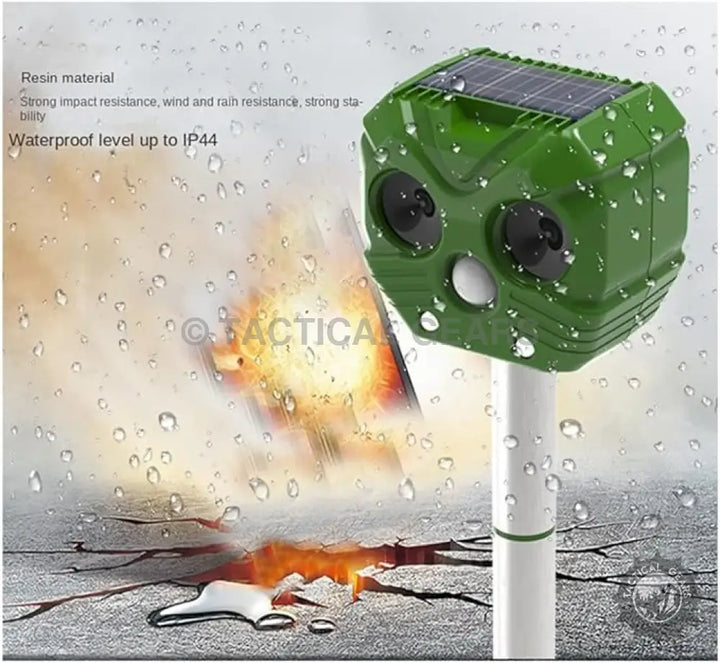 Green solar-powered outdoor animal repellent with IP44 waterproof rating for effective pest control