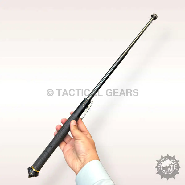 Spring loaded self defence baton with textured grip and metal pocket clip extended