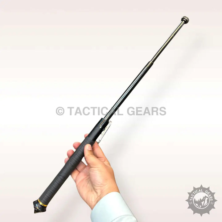 Spring loaded self defence baton with textured grip and metal pocket clip extended