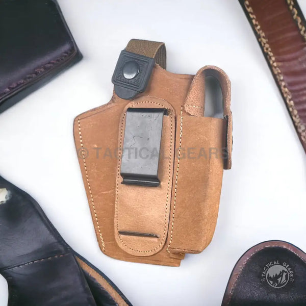 Brown leather gun holster with metal belt clip and magazine pouch for 9mm pistols