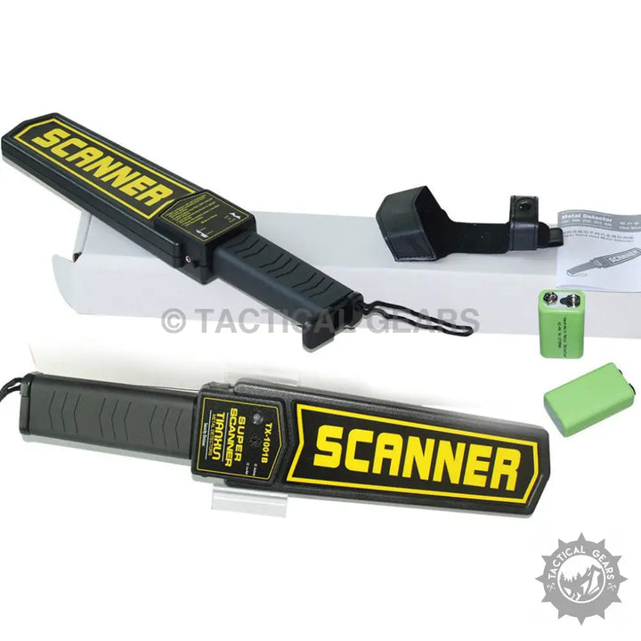 Black handheld metal detectors with yellow SCANNER lettering, belt holster, and batteries
