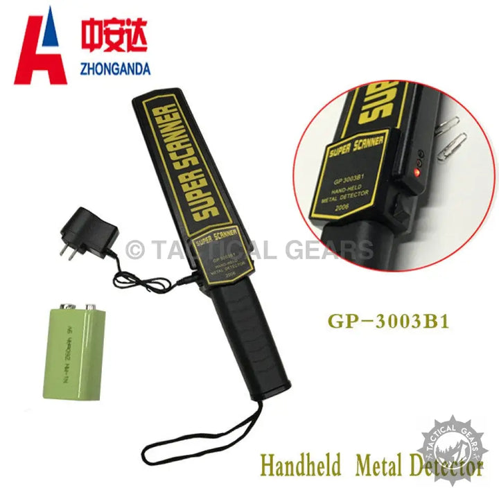 Black handheld metal detector with charger and battery for security screening