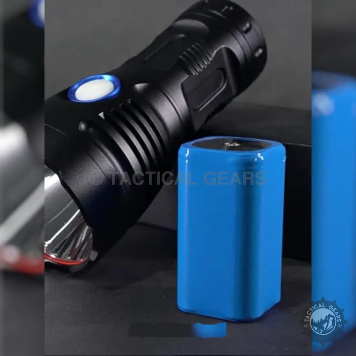 Black flashlight with blue power button and rechargeable battery for Super Strong Hand Flashlight