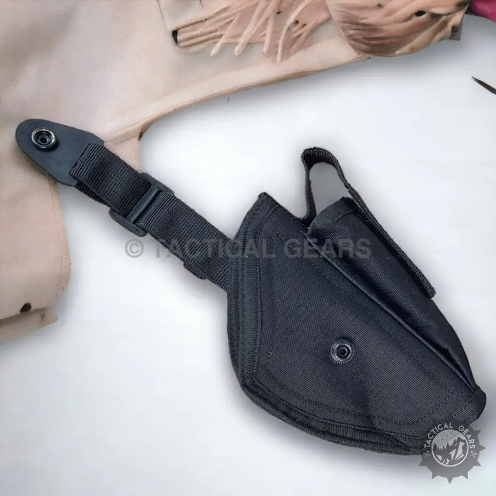 Black nylon tactical 9mm belt holster with built-in mag pouch and adjustable strap