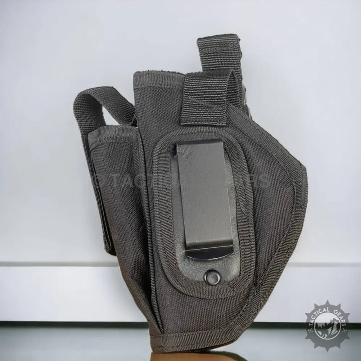 Black tactical 9mm belt holster with built-in mag pouch for secure firearm carry