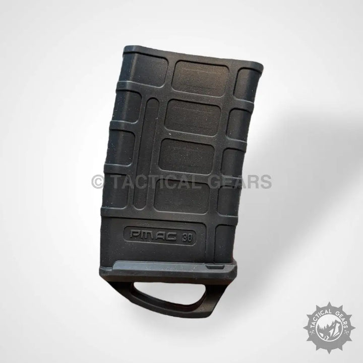 Black polymer rifle magazine with integrated loop base plate for Tactical Assist Rubber Magpul