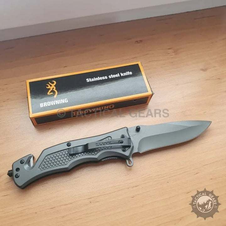 Grey folding Browning DA333 hunting knife with textured handle and pocket clip