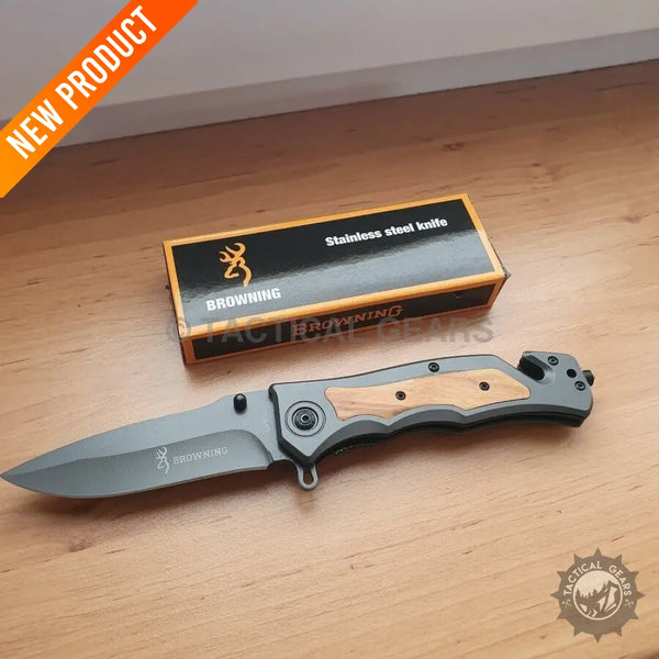 Closed gray Browning DA333 hunting knife with wood handle and black box display