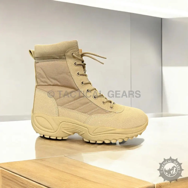 Tan tactical desert combat boots with thick soles and prominent lacing system