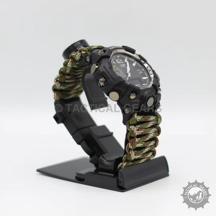 Black tactical wristwatch with camouflage paracord strap, perfect as a survival paracord watch