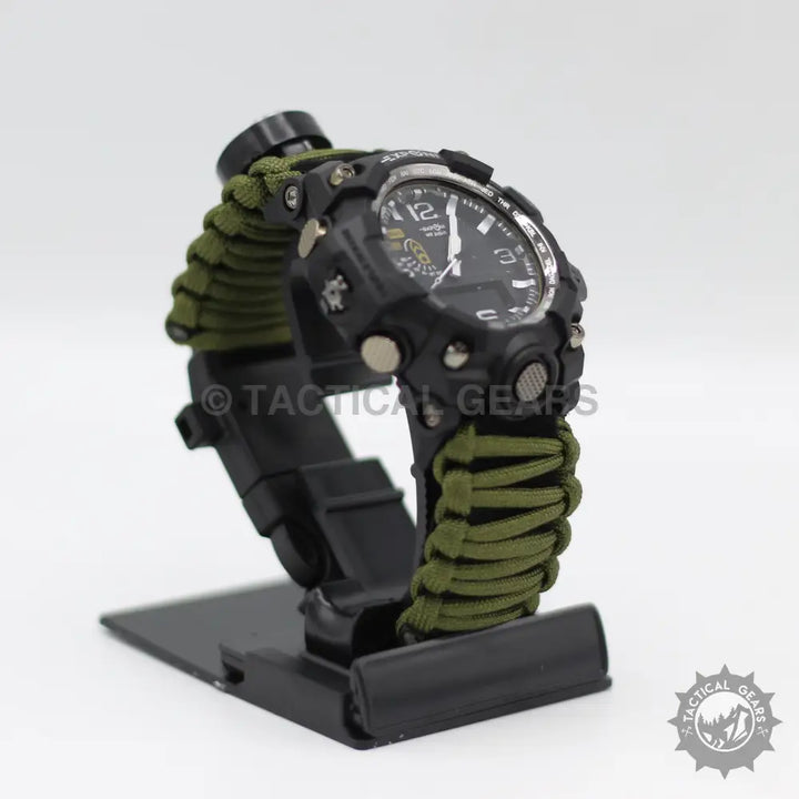 Black tactical wristwatch with green paracord band, ideal for survival paracord watch enthusiasts