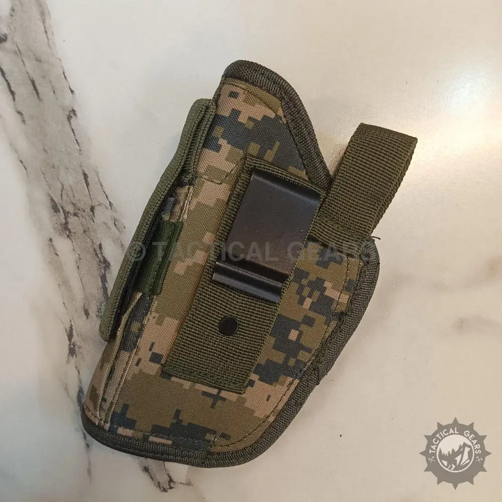 Digital camouflage fabric pistol holster with pouch, black belt clip, and olive green webbing